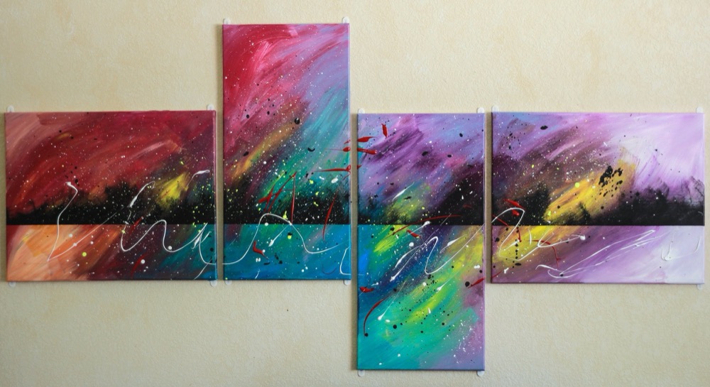 abstract four-panel galaxy painting in red, teal, and purple
