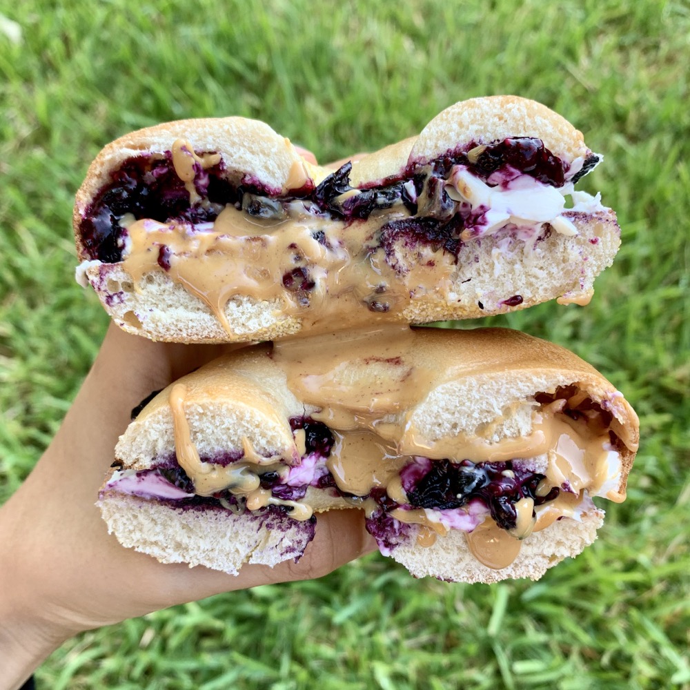 bagel with blueberries, cream cheese, and peanut butter