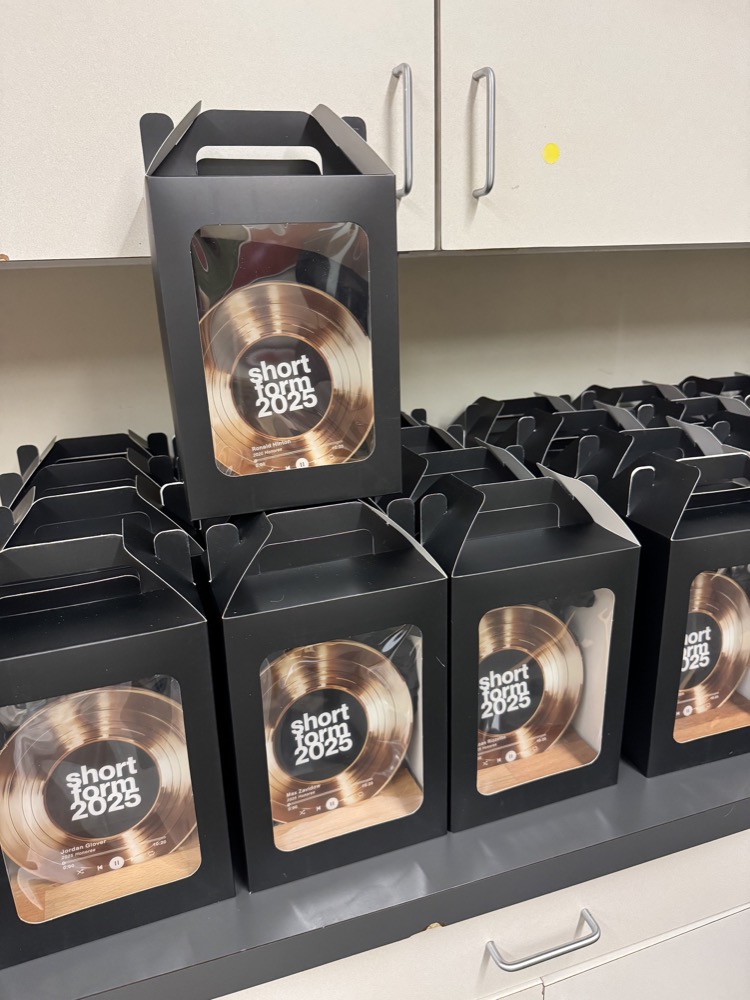 boxed gold record party favors labeled short form 2025