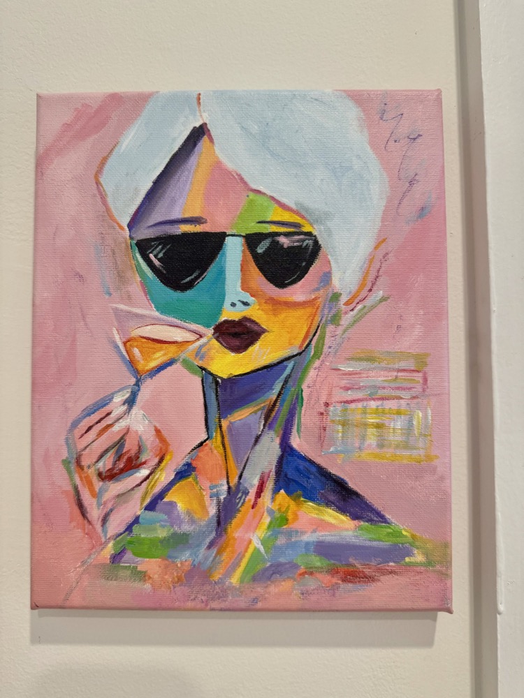 colorful painting of a woman in sunglasses sipping wine